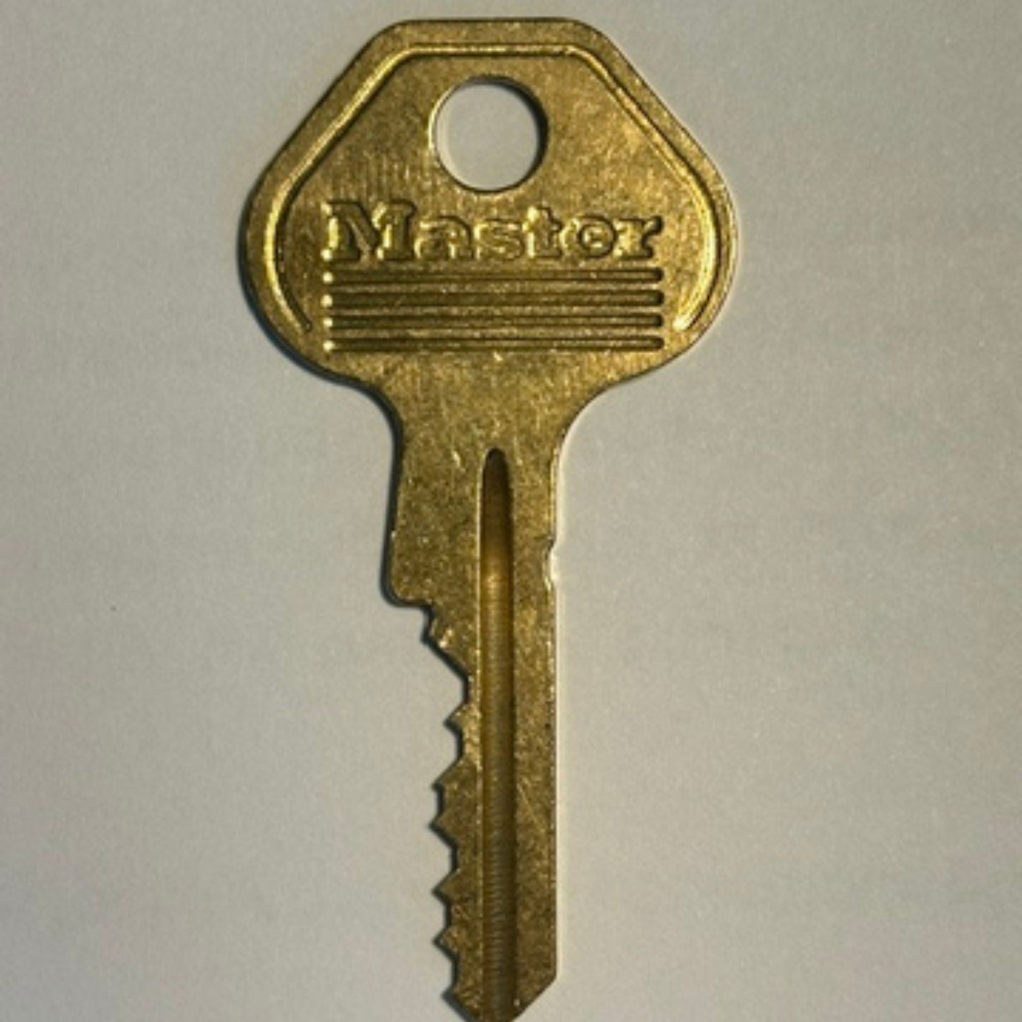 Master Lock No. K7000 Cut Key For W7000 Series Padlocks 400K001 Through 400K569 - The Lock Source