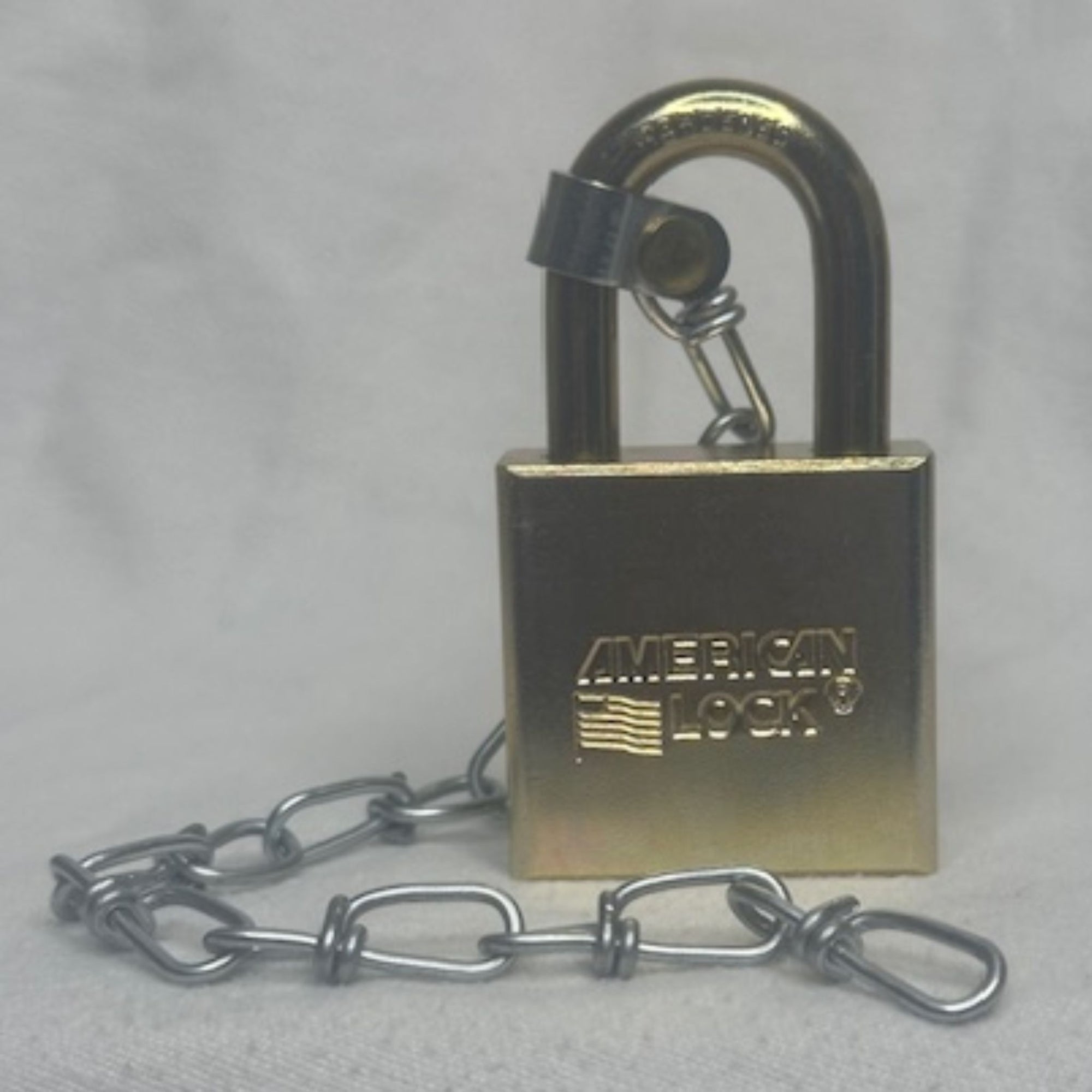 American Lock No. A5200GLWNKA Government Padlock With Attached Chain and Bump Stop Feature - The Lock Source