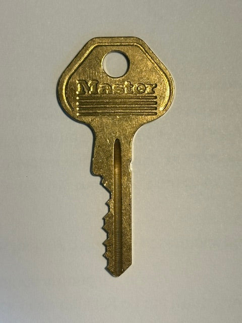 Master Lock K7000 cut key for W7000 cylinder key numbers 400K001 through 400K569