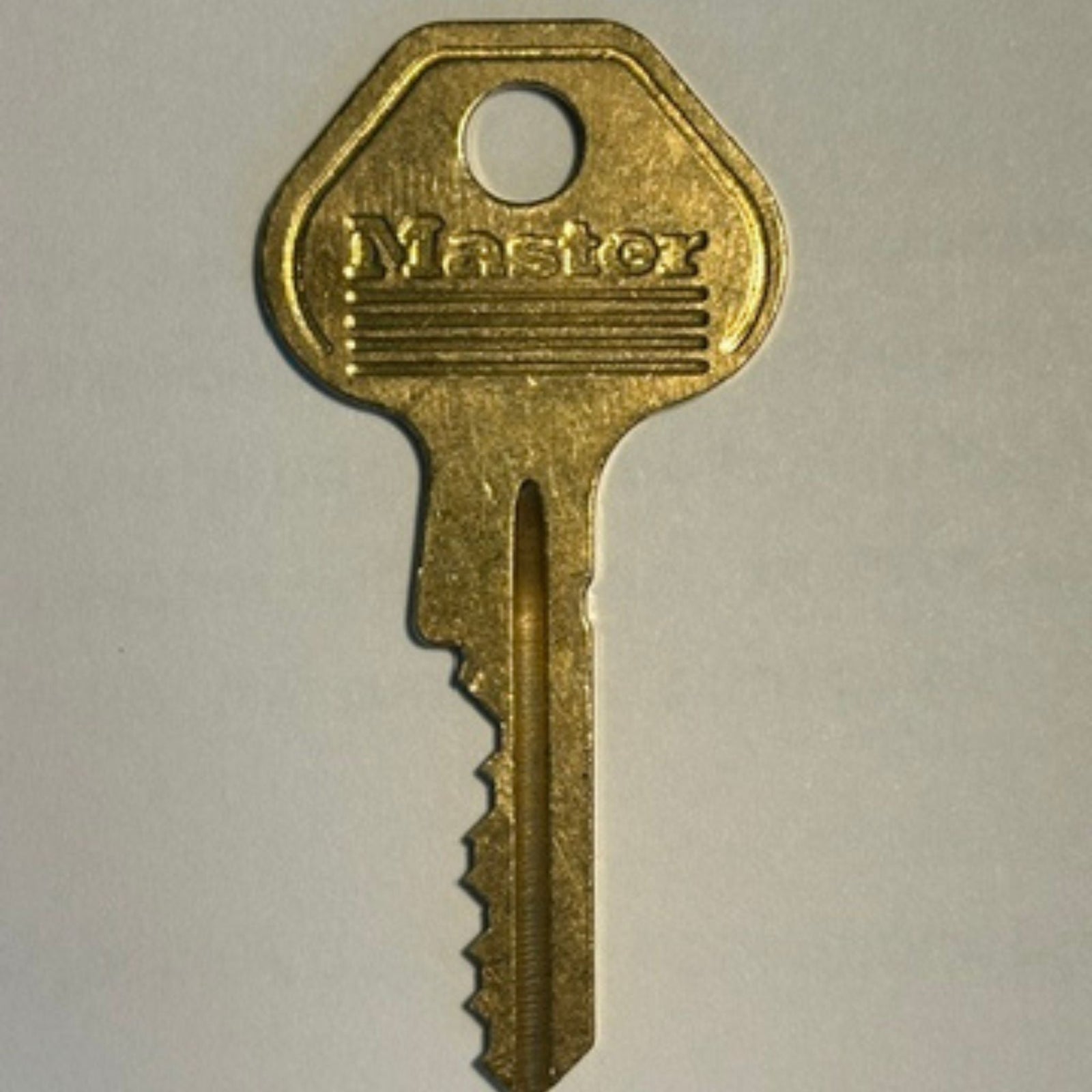 Master Lock No. K7000 Cut Key For W7000 Series Padlocks 400K001 Through 400K569 - The Lock Source